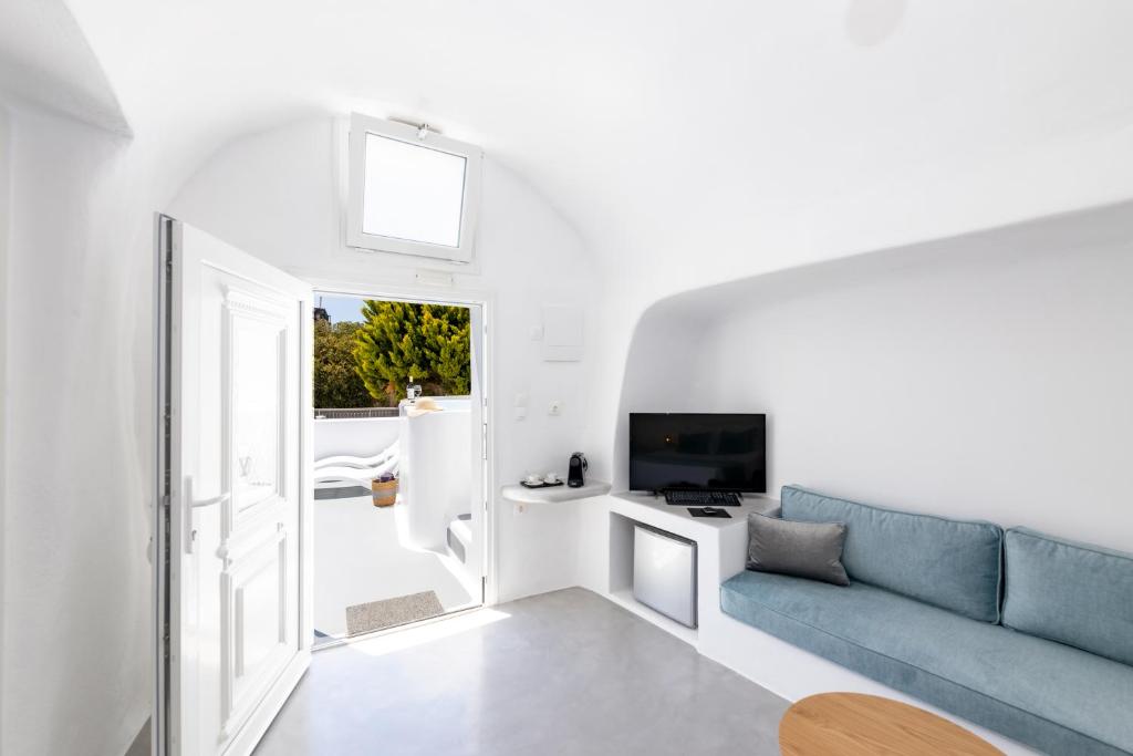 TV a/nebo společenská místnost v ubytování Evas House