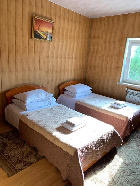 Postel nebo postele na pokoji v ubytování Pid Yavorom