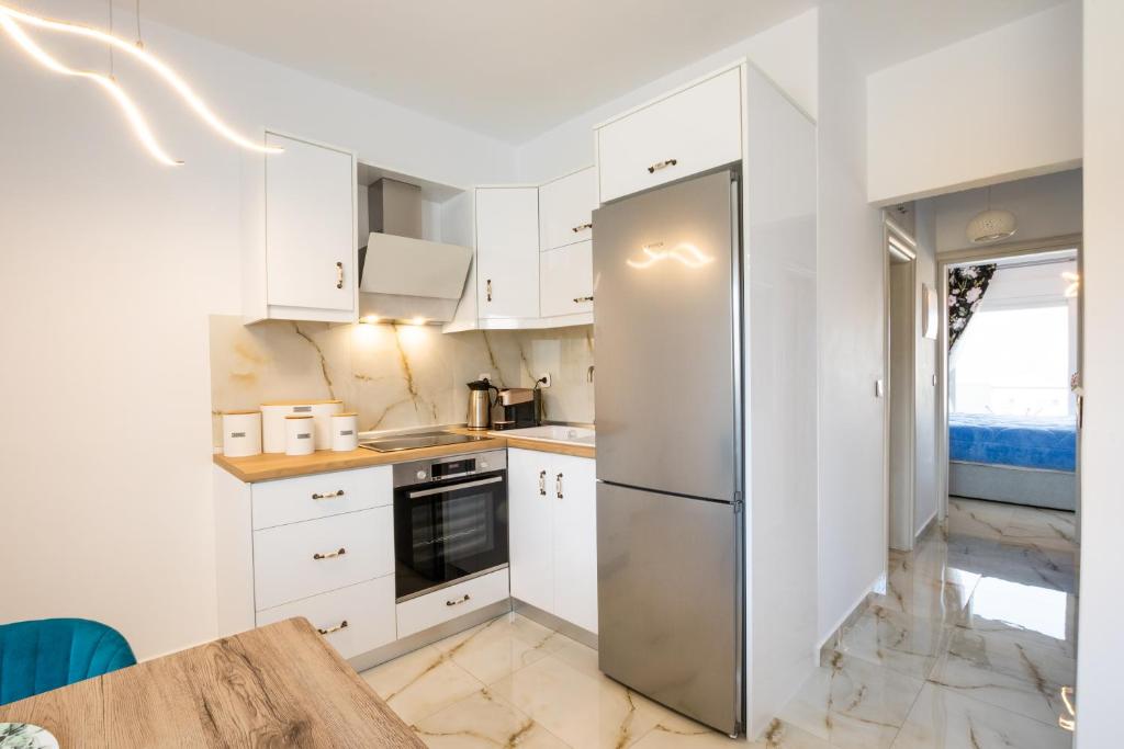 Kuchyň nebo kuchyňský kout v ubytování Punta Mare Homes