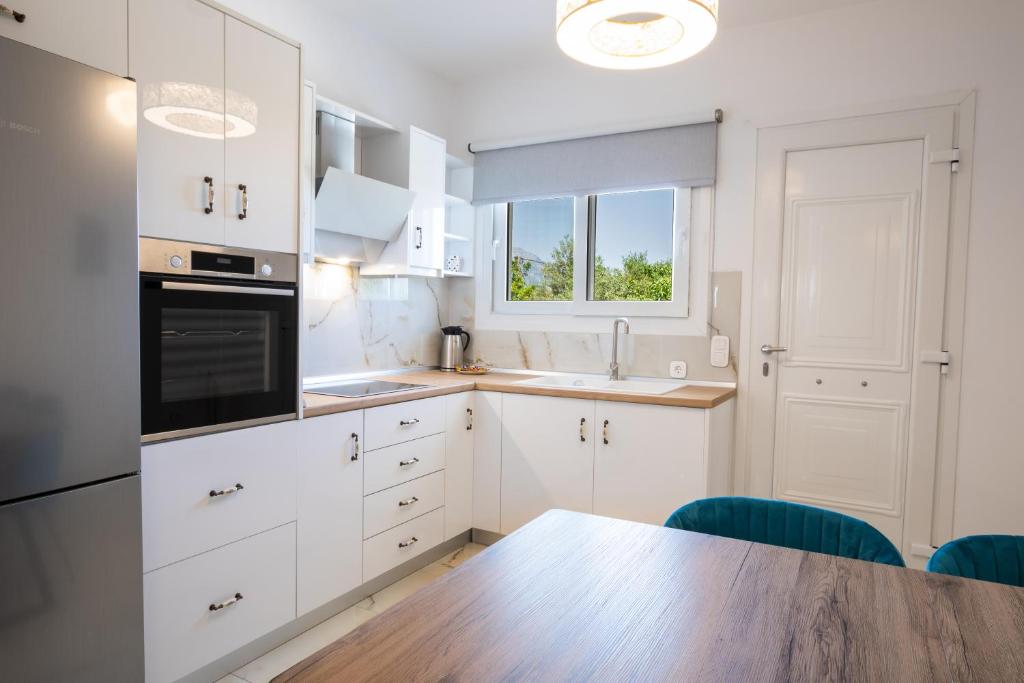 Kuchyň nebo kuchyňský kout v ubytování Punta Mare Homes