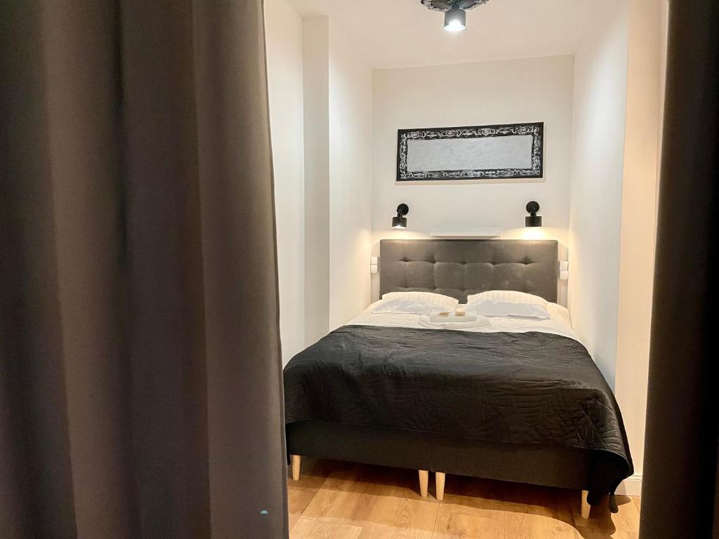 Posteľ alebo postele v izbe v ubytovaní Petite Viste No. 3 Apartment