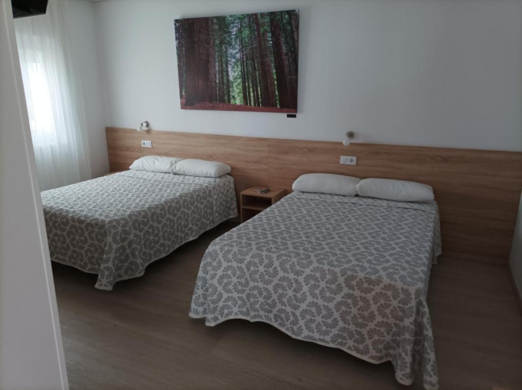 Postel nebo postele na pokoji v ubytování Las Huertas