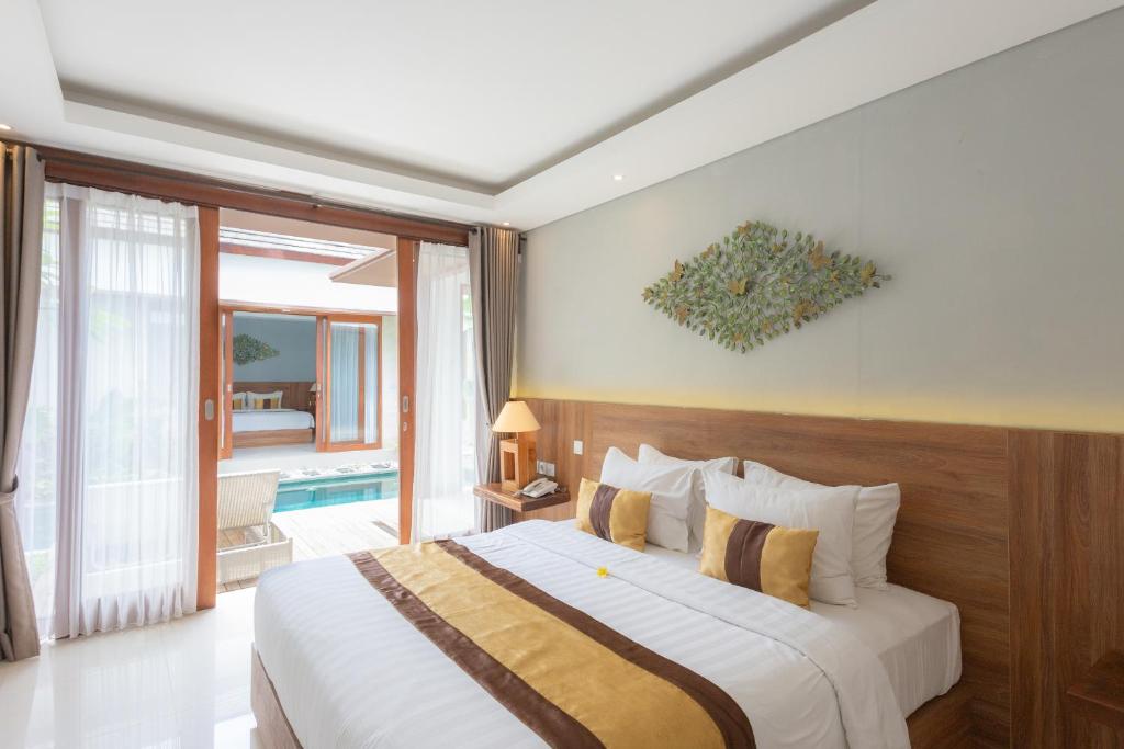 Ένα ή περισσότερα κρεβάτια σε δωμάτιο στο The Sakaye Villas & Spa