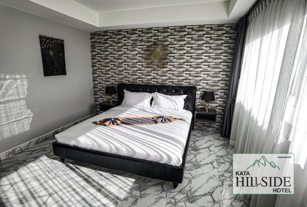 Postel nebo postele na pokoji v ubytování Kata Hillside Hotel