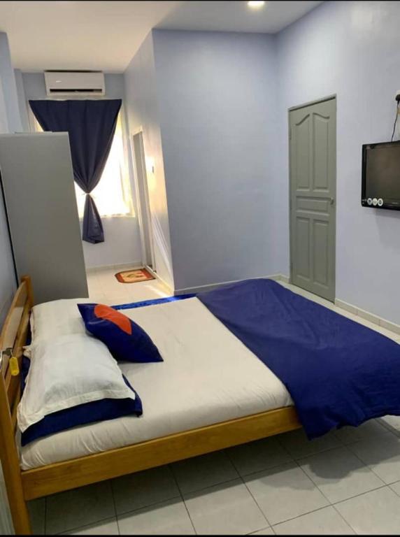 Postel nebo postele na pokoji v ubytování BerataStay @ Segamat