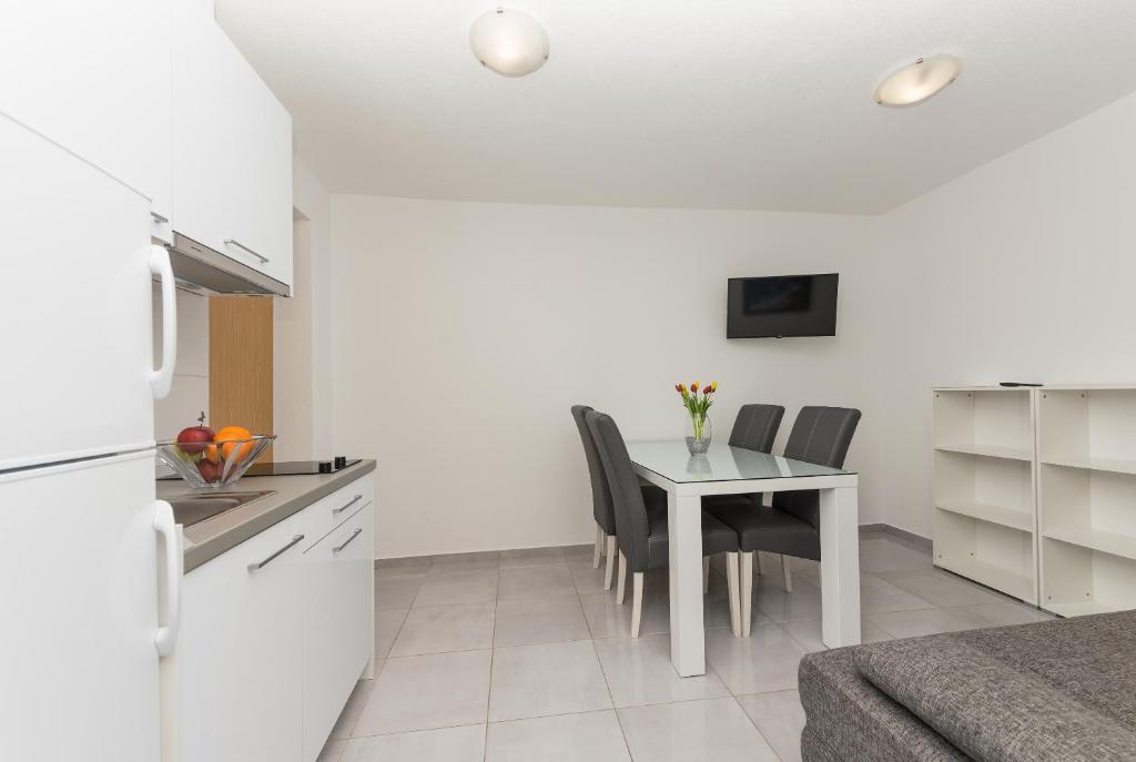 Kuchyňa alebo kuchynka v ubytovaní Apartments M&A