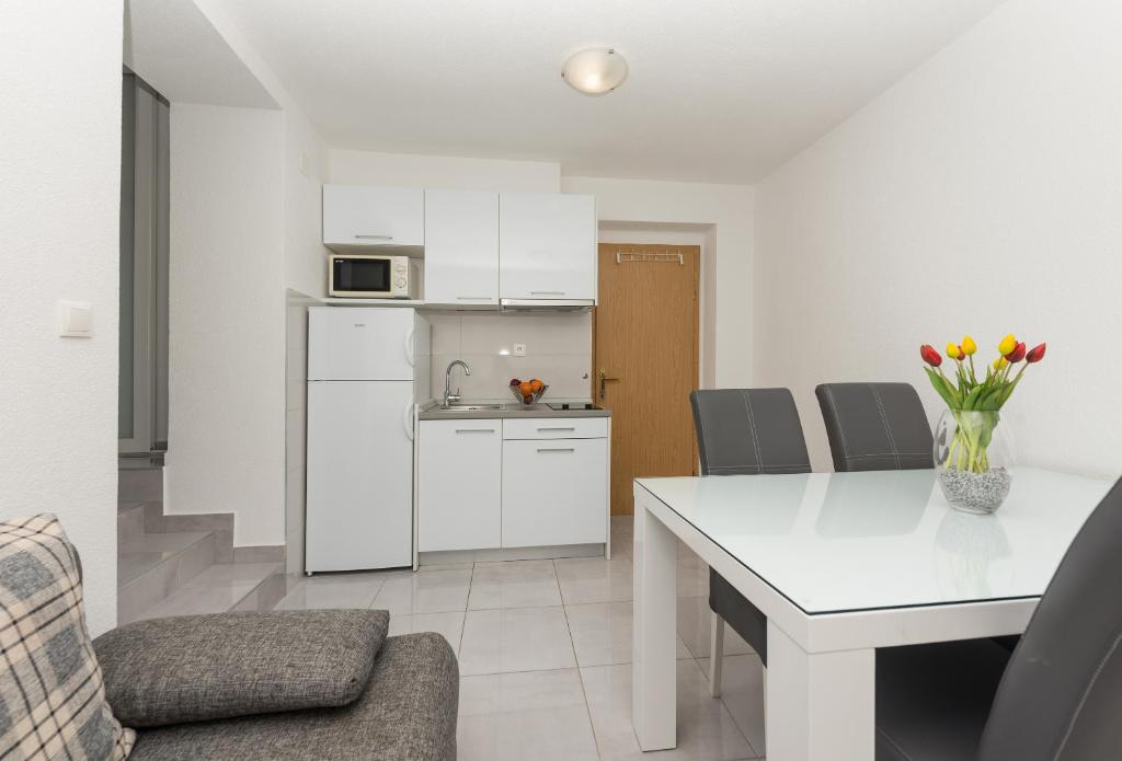 Kuchyňa alebo kuchynka v ubytovaní Apartments M&A
