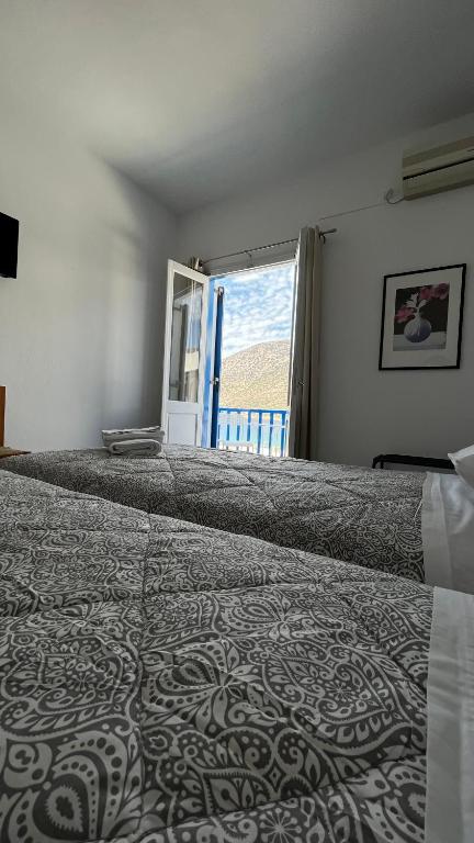 Voodi või voodid majutusasutuse Meropi Rooms toas