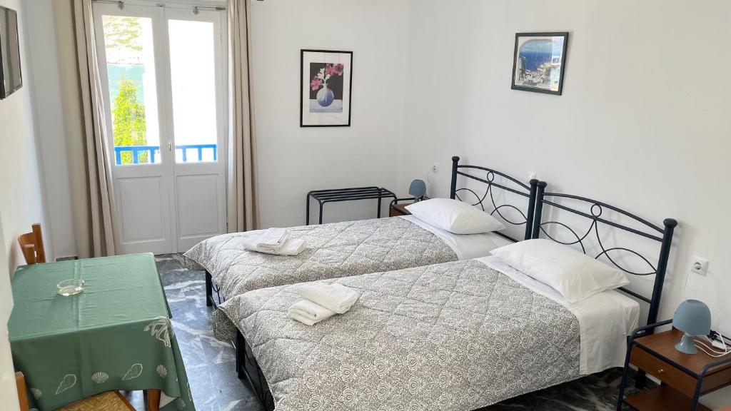 Voodi või voodid majutusasutuse Meropi Rooms toas