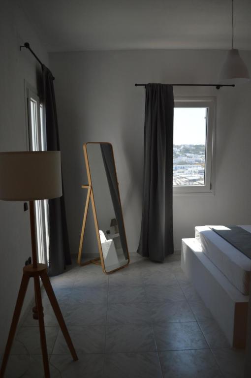Postel nebo postele na pokoji v ubytování Revel Mykonos 4