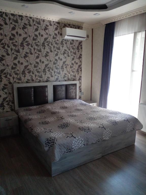 Postel nebo postele na pokoji v ubytování Guest house UTA