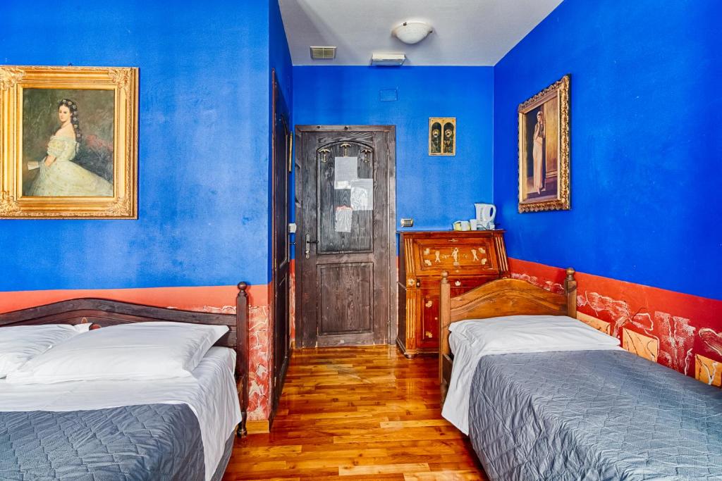 Postel nebo postele na pokoji v ubytování Hotel Portacavana