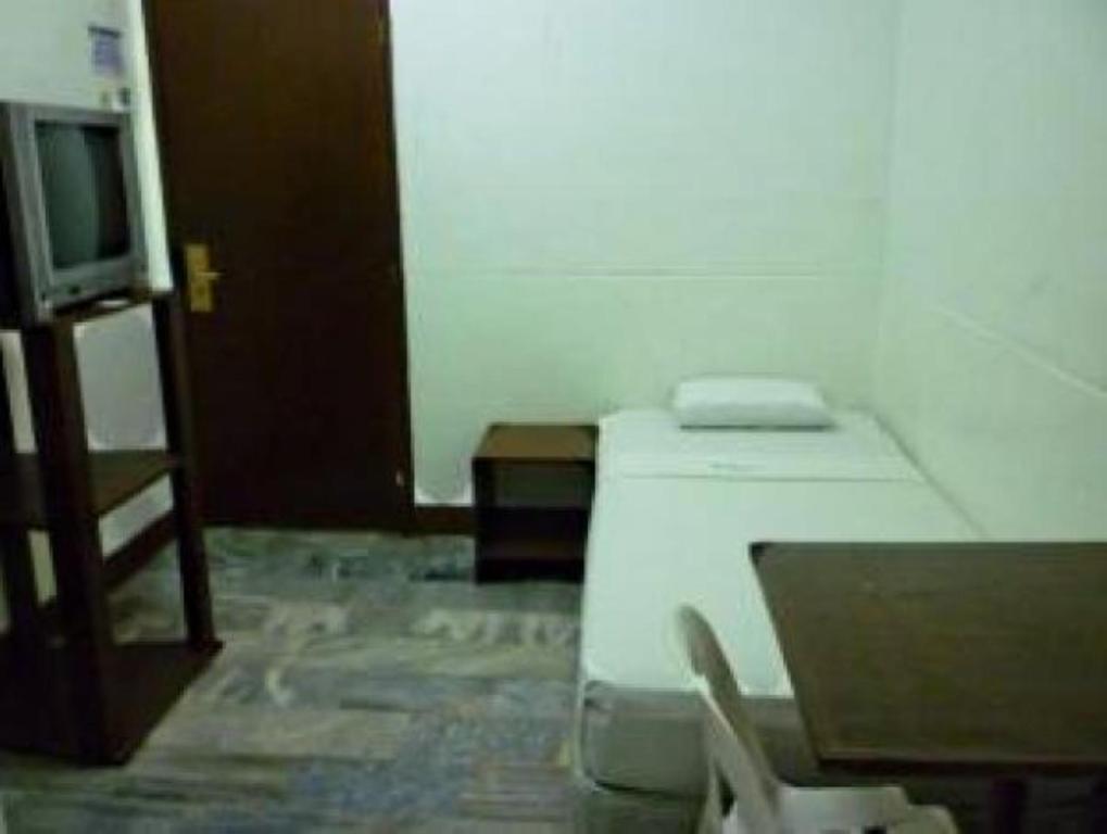 Postel nebo postele na pokoji v ubytování GV Hotel - Davao