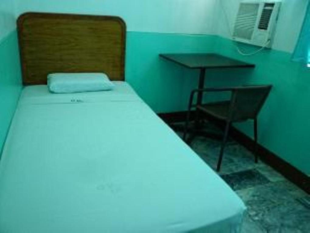 Postel nebo postele na pokoji v ubytování GV Hotel - Davao