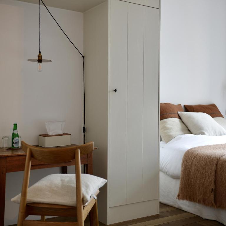 Postel nebo postele na pokoji v ubytování Boetiekhotel Hemelhuys