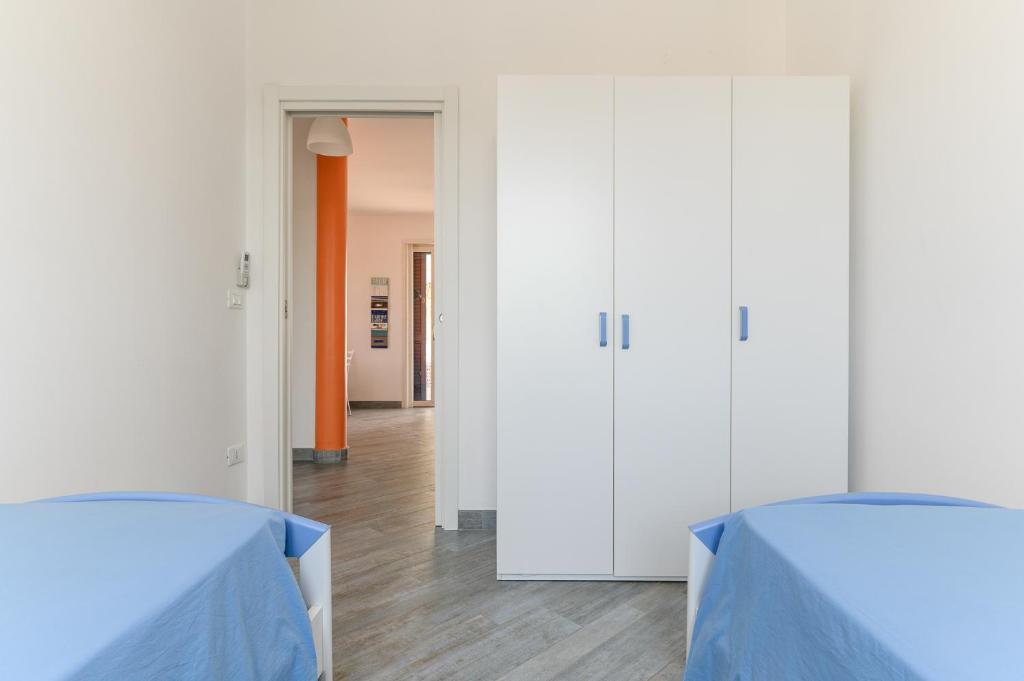 Postel nebo postele na pokoji v ubytování Casa Maiolica