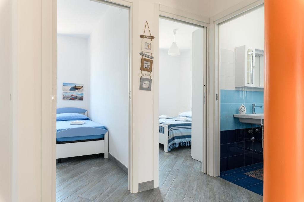 Postel nebo postele na pokoji v ubytování Casa Maiolica