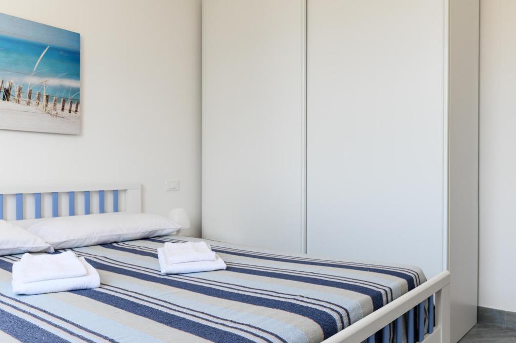Postel nebo postele na pokoji v ubytování Casa Maiolica