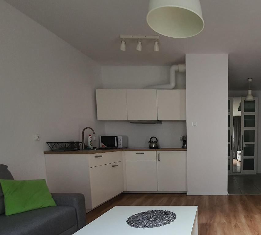 Kuchyňa alebo kuchynka v ubytovaní Apartament Studio z basenem & SPA - Gdańsk Śródmieście - Stare Miasto