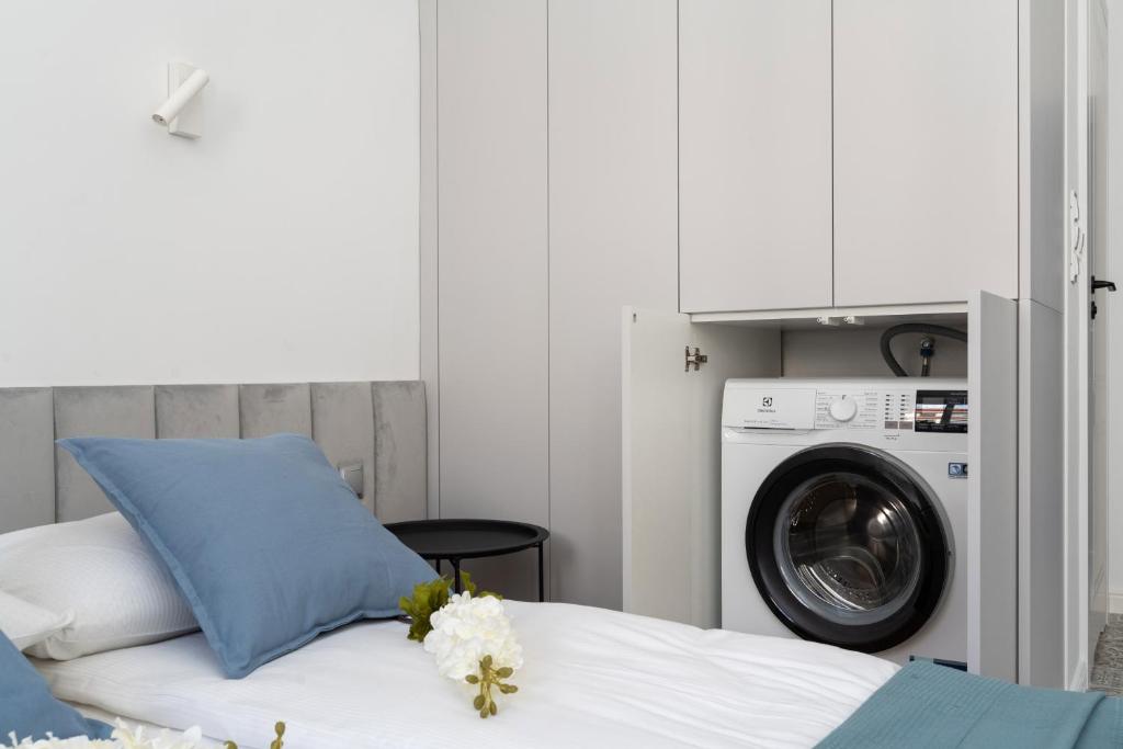 Posteľ alebo postele v izbe v ubytovaní Old Town Studio by Noclegi Renters