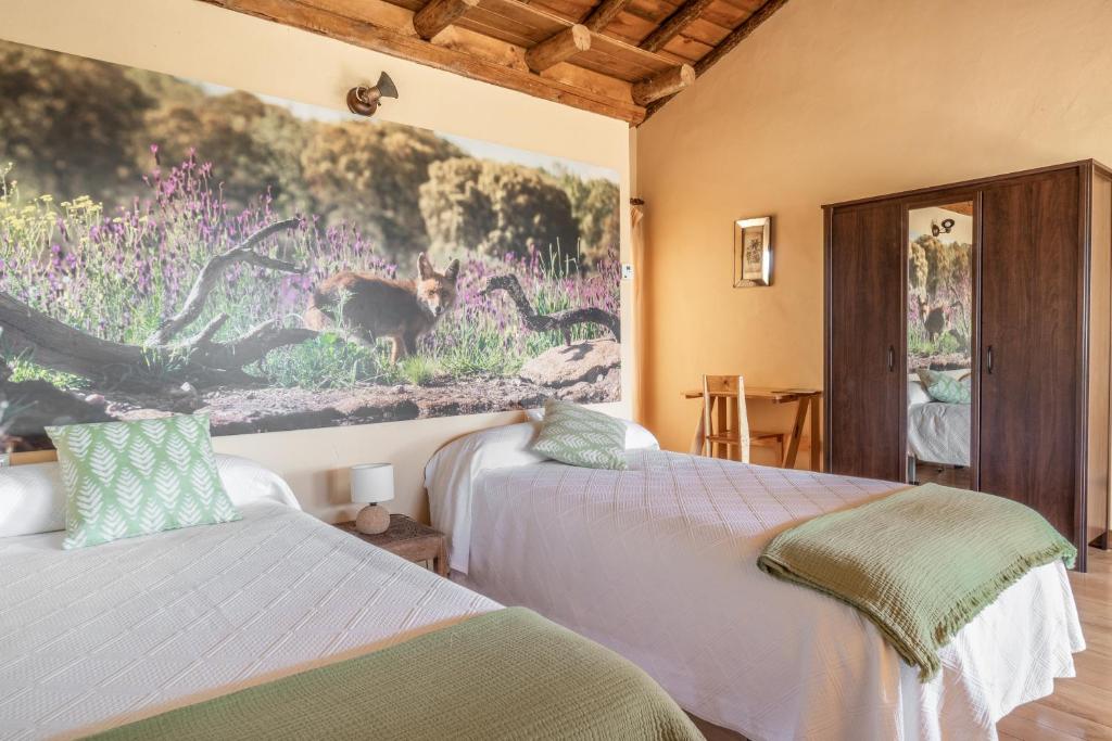 Posteľ alebo postele v izbe v ubytovaní Eco-Lodge en la Reserva Privada Campanarios de Azaba - Proyecto de Conservación