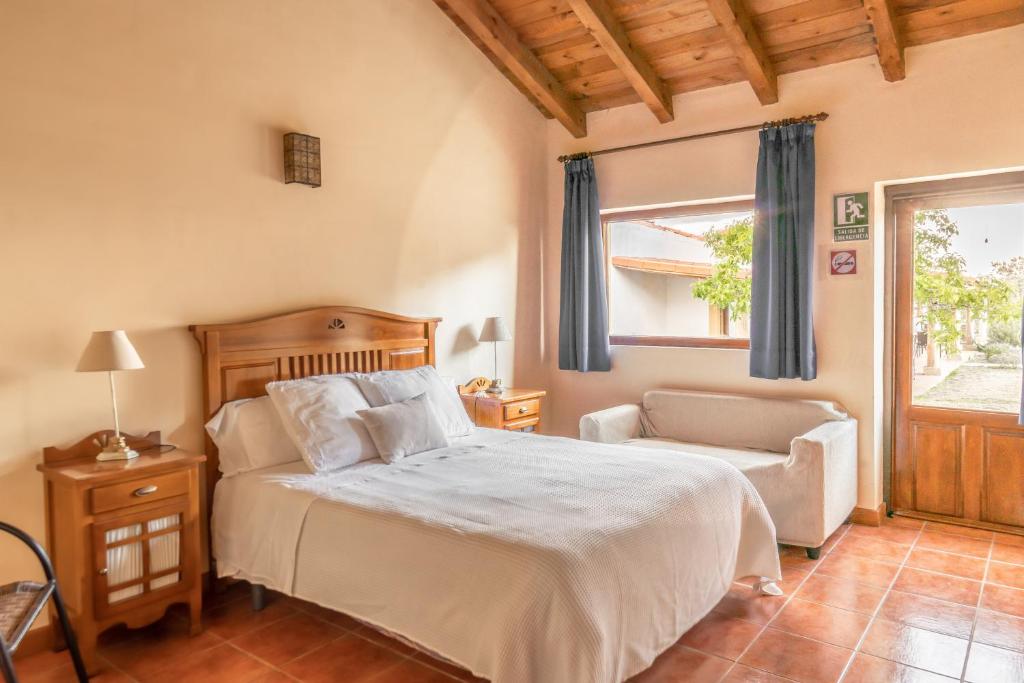 Posteľ alebo postele v izbe v ubytovaní Eco-Lodge en la Reserva Privada Campanarios de Azaba - Proyecto de Conservación
