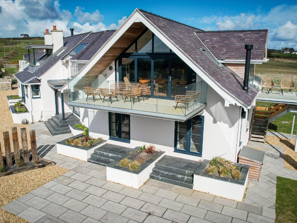 an aerial view of a house with a patio at Glan Towyn in Holyhead