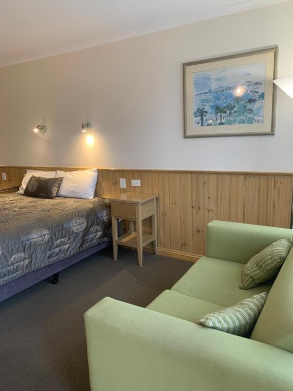 Postel nebo postele na pokoji v ubytování LaTrobe Motel Morwell