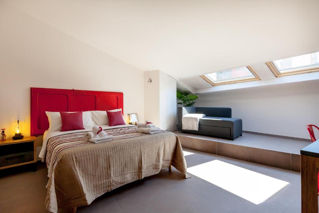 A bed or beds in a room at Lo Speziale - Corbezzolo