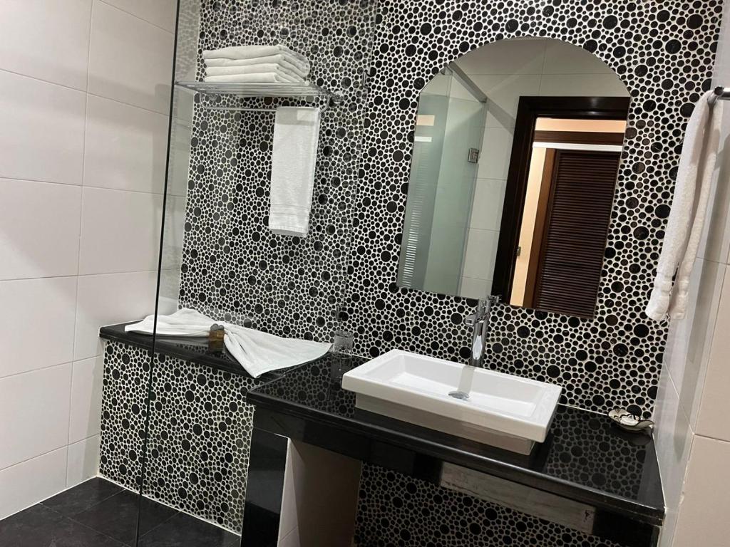 Koupelna v ubytování Hotel La Capitale