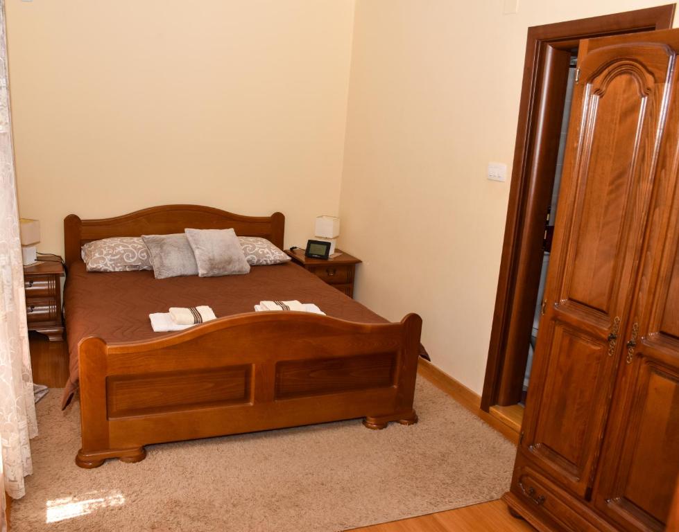 Postel nebo postele na pokoji v ubytování Apartments Simun