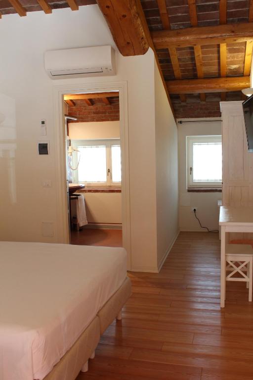 Postel nebo postele na pokoji v ubytování Hotel Albergo al Sole