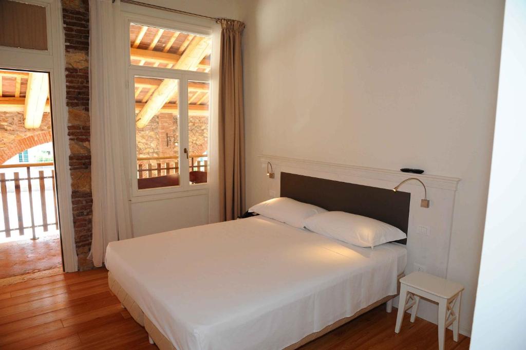 Postel nebo postele na pokoji v ubytování Hotel Albergo al Sole