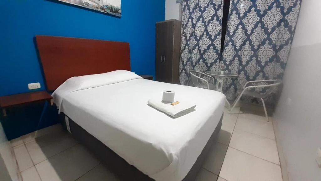 Postel nebo postele na pokoji v ubytování AYPA Hostal