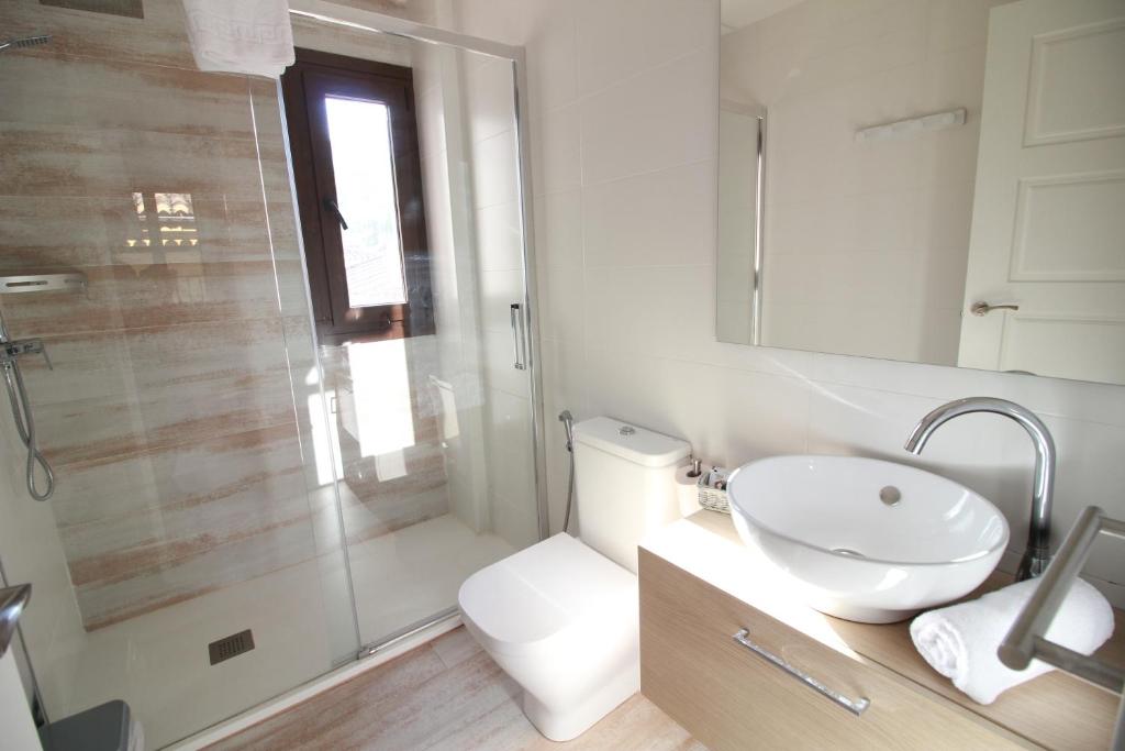 Koupelna v ubytování GLORIA SUITES