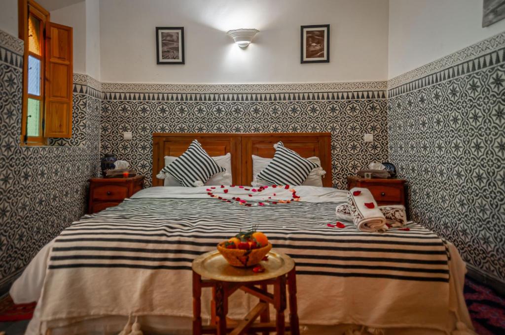 Postel nebo postele na pokoji v ubytování Riad Dar Mamouni