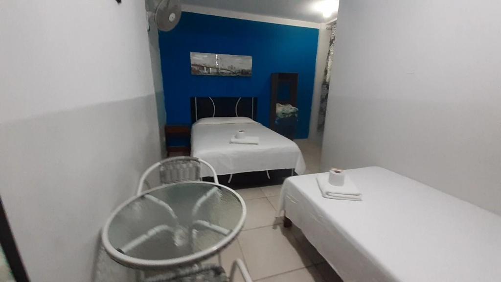 Postel nebo postele na pokoji v ubytování AYPA Hostal