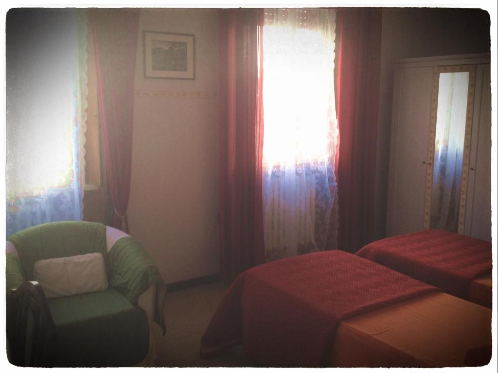 Postel nebo postele na pokoji v ubytování B&B Borgomarino