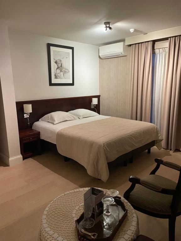 Postel nebo postele na pokoji v ubytování Hotel Prélude