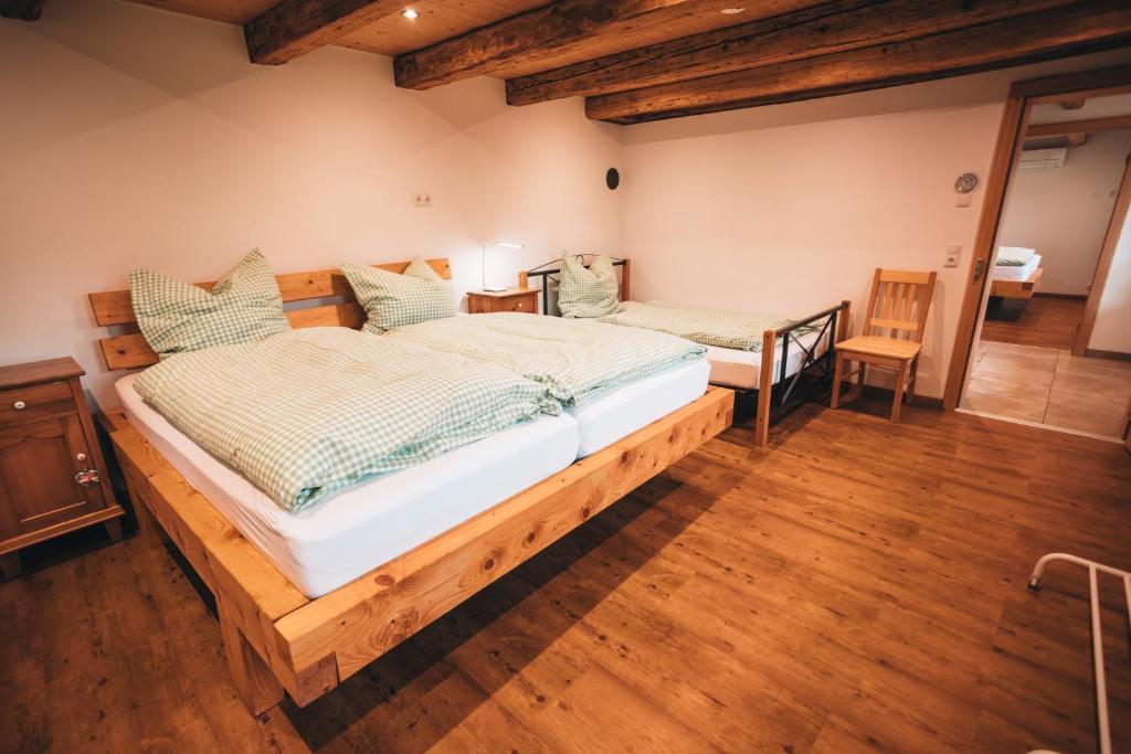 Een bed of bedden in een kamer bij Ferienhaus Woidhaus