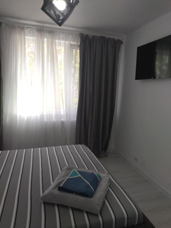 Postel nebo postele na pokoji v ubytování Apartament max. confort
