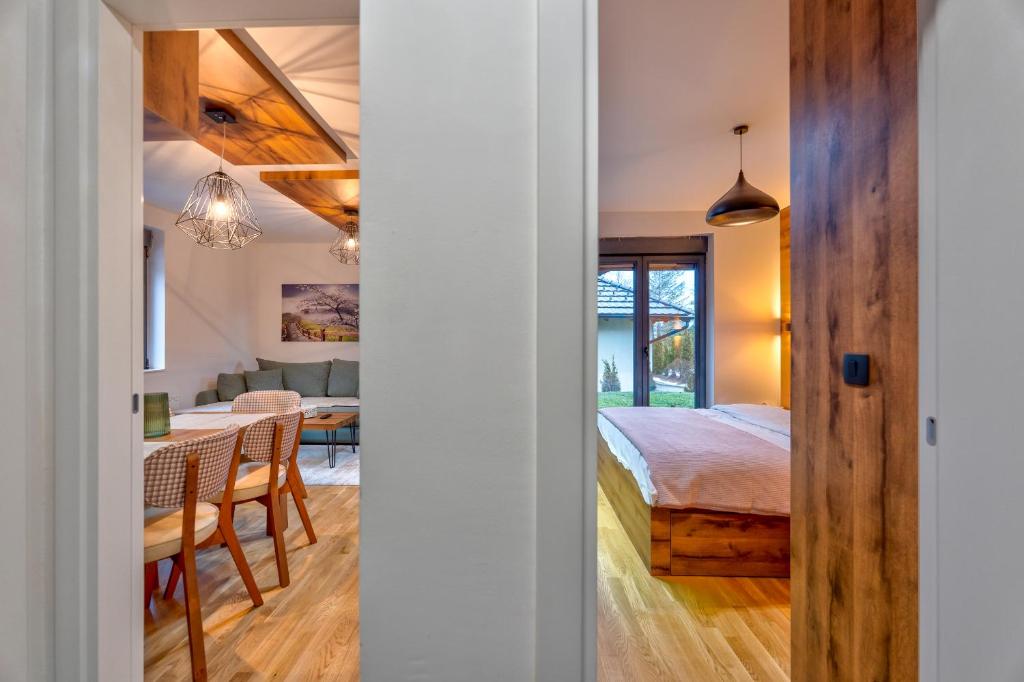 Postel nebo postele na pokoji v ubytování Andrijana Home