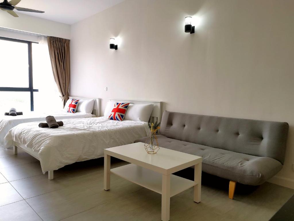 Postel nebo postele na pokoji v ubytování Bell Suite - The Premium Suite @ Sepang
