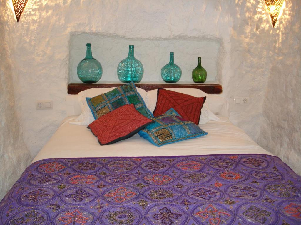 Cama o camas de una habitación en Cueva de La Alegría