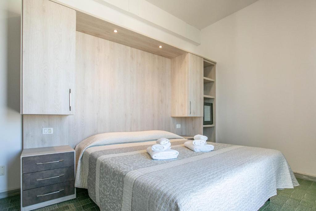 Postel nebo postele na pokoji v ubytování Hotel Mara