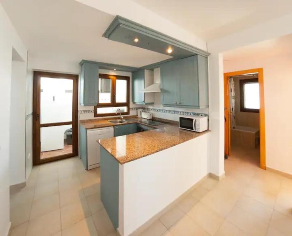 Kuchyň nebo kuchyňský kout v ubytování Marina d'Or l V casa 4