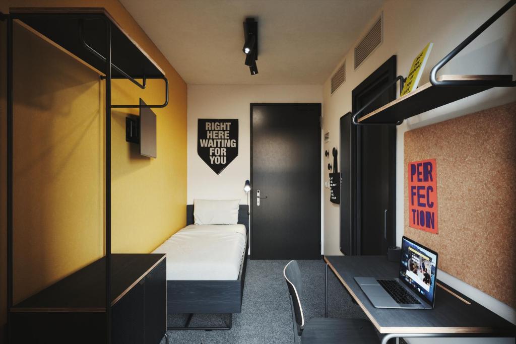 Postel nebo postele na pokoji v ubytování The Social Hub Madrid
