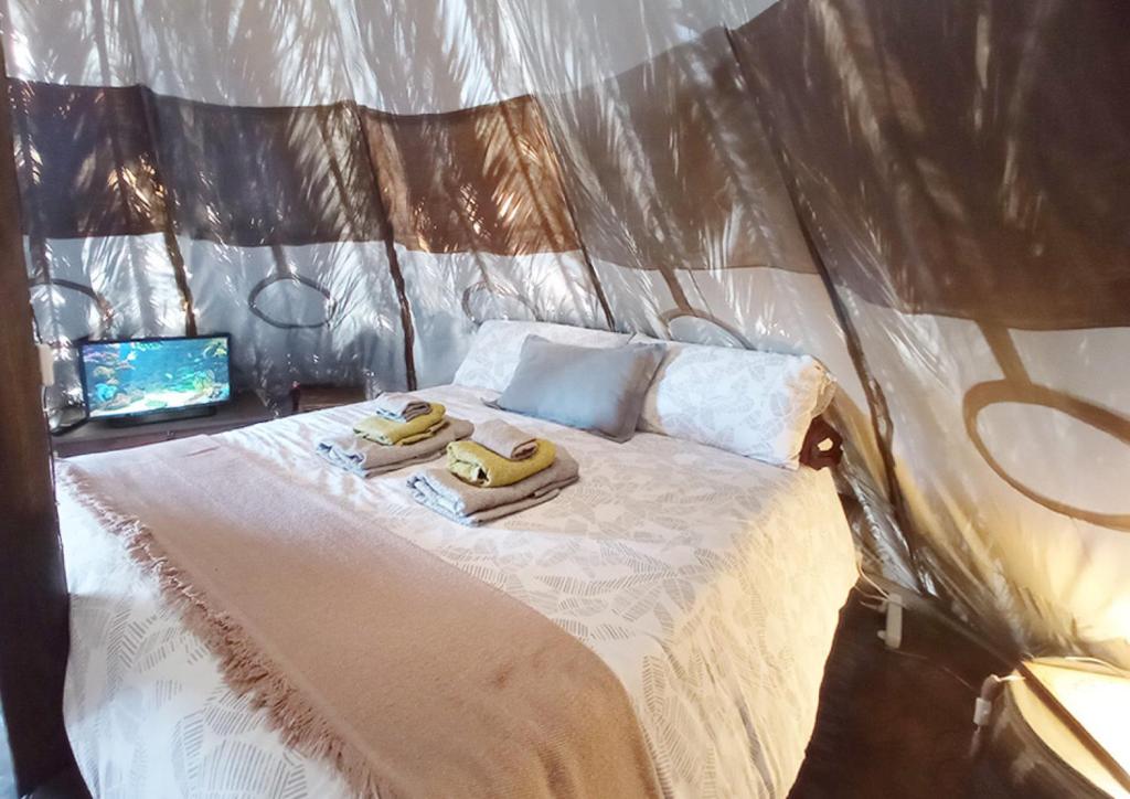 Postel nebo postele na pokoji v ubytování Studio Mazo The Glamping