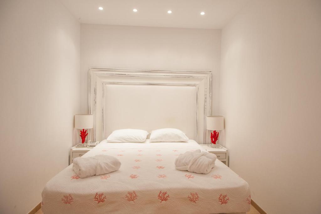 Posteľ alebo postele v izbe v ubytovaní Villa Dimitra by Elounda Island View Villas