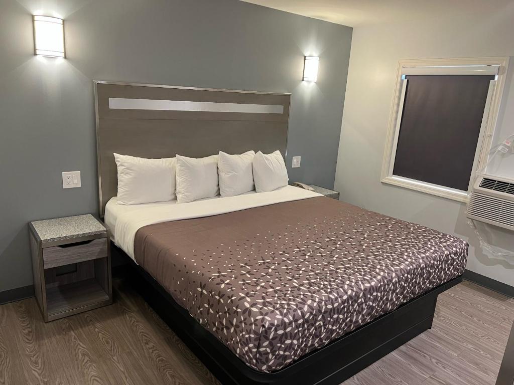 Postel nebo postele na pokoji v ubytování 112 Motel